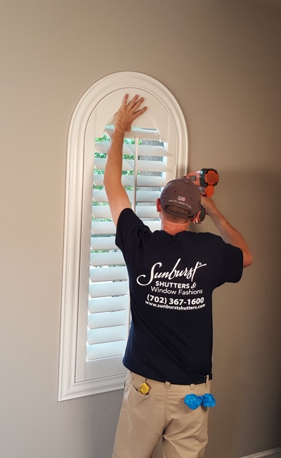 Shutter install in Austin family room